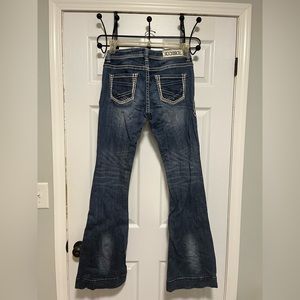 Rock and Roll woman’s trouser jeans 27x36